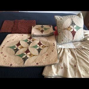 4 shams, 1 queen bed skirt and 1 toss pillow